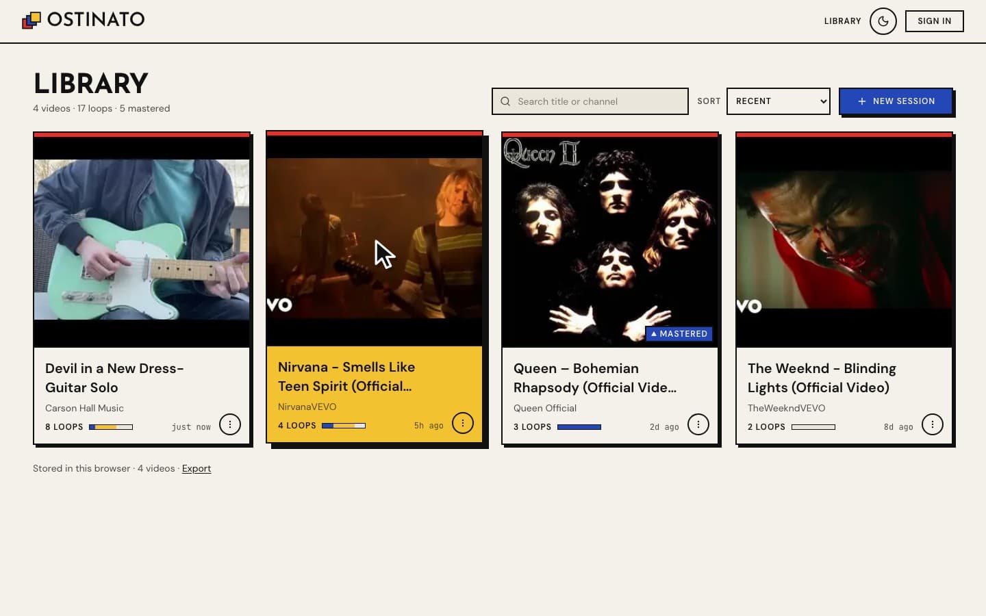 The library: four videos as cards, one with a MASTERED badge